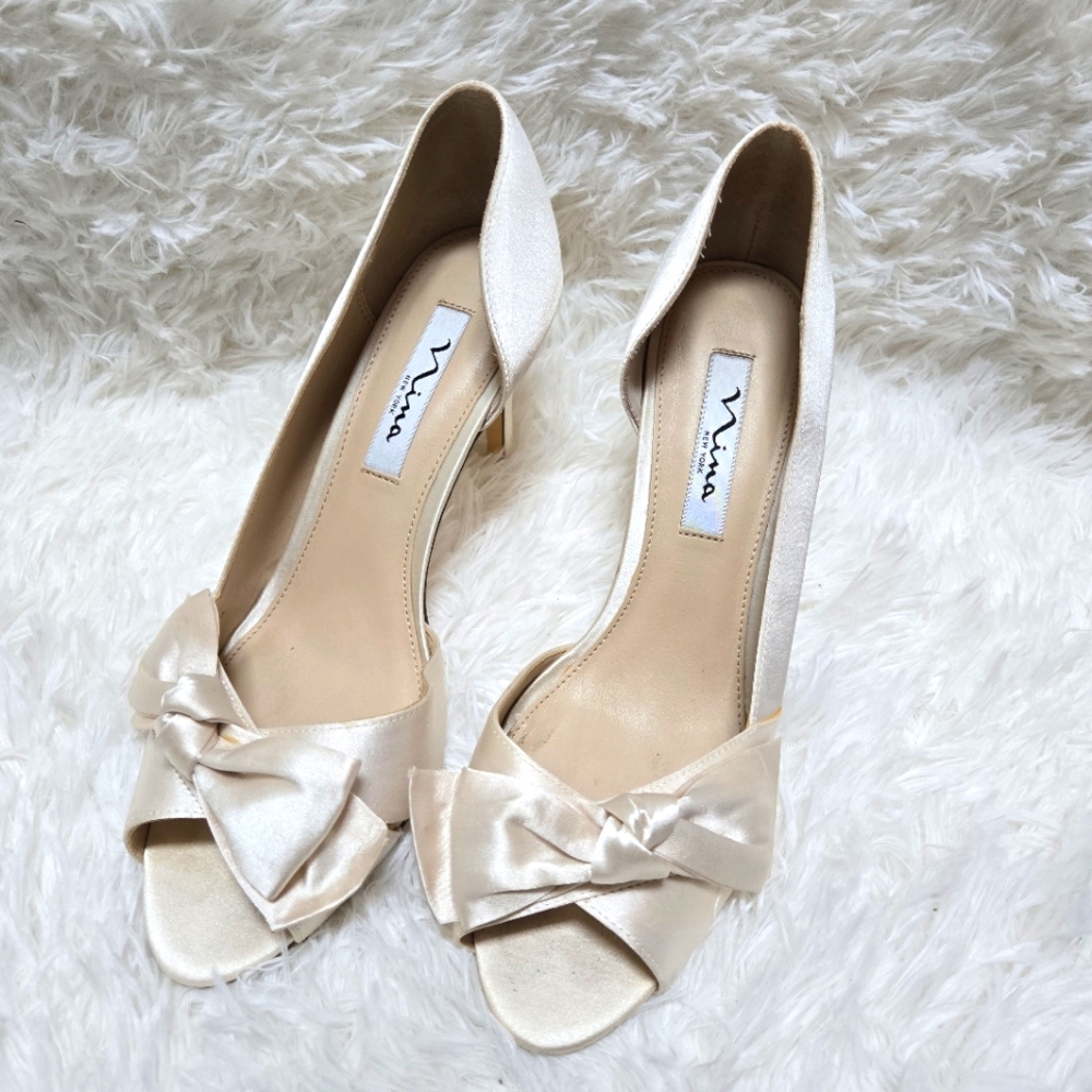 Nina Forbes2 cream satin peep-toe heels bow accent
